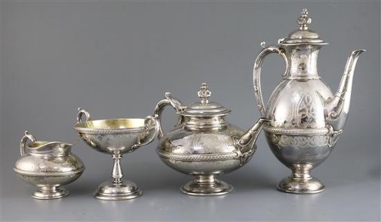 A Victorian four-piece engraved silver and silver-gilt pedestal tea and coffee service, by Frederick Elkington, gross 87.5 oz.